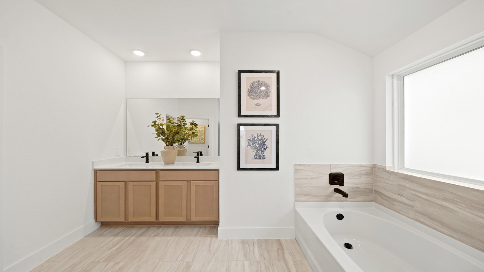 Primary bathroom with tub and shower