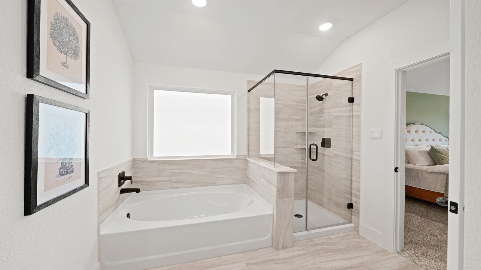 Primary bathroom with tub and shower