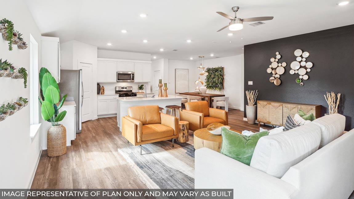open concept living and dining room with vinyl flooring and large windows
