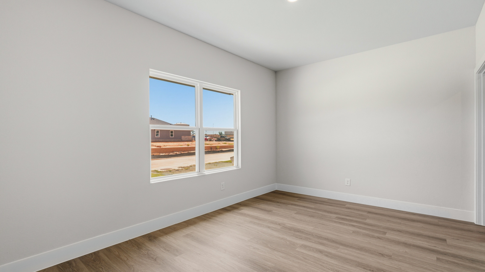 Dining area with vinyl flooring located off from the living room area in Montgomery TX