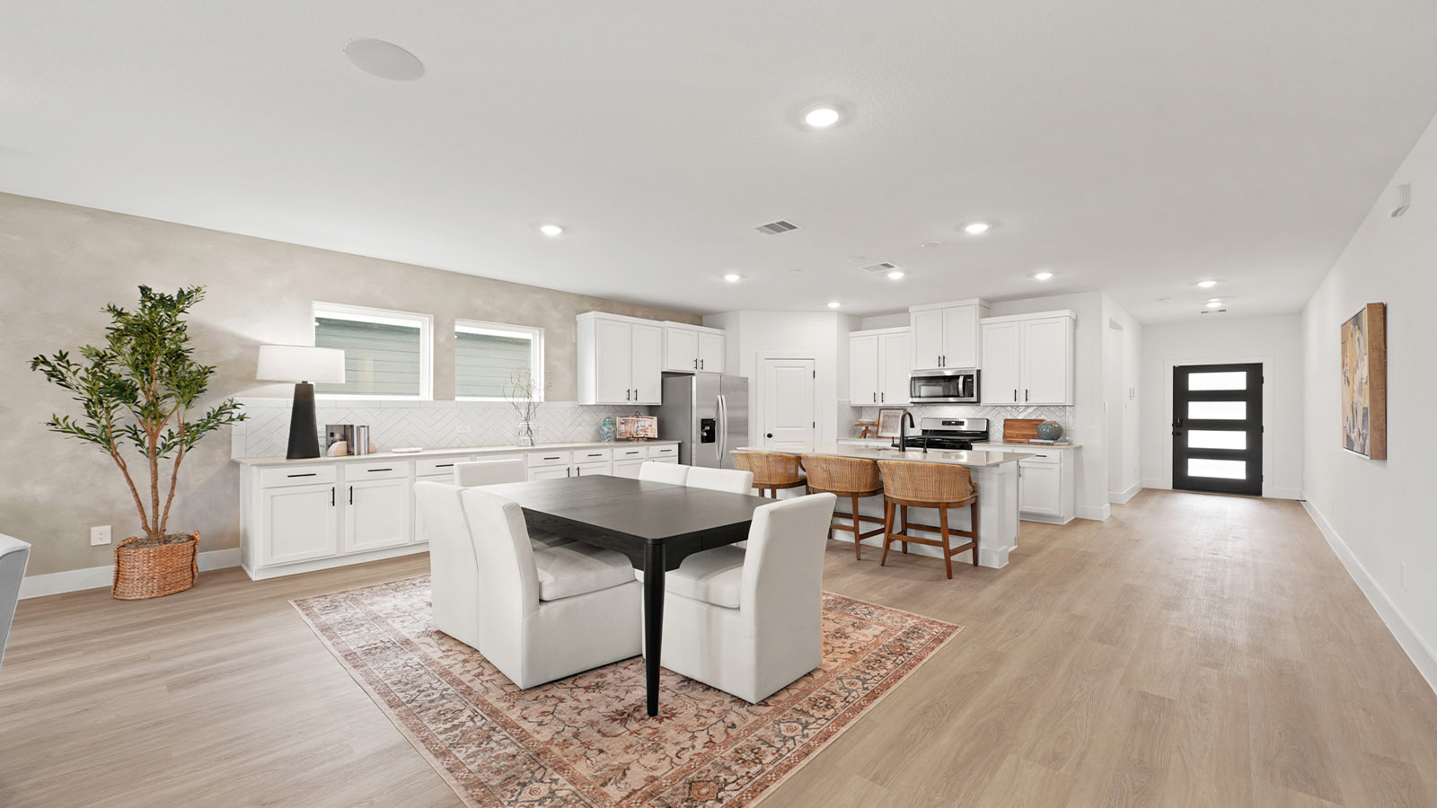 Kitchen with an island and vinyl floor