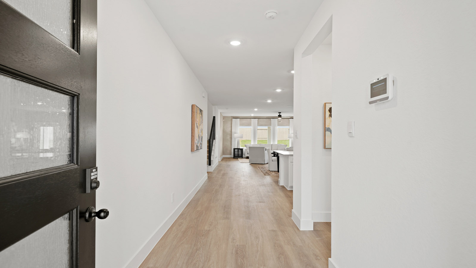 Entry hallway with vinyl flooring