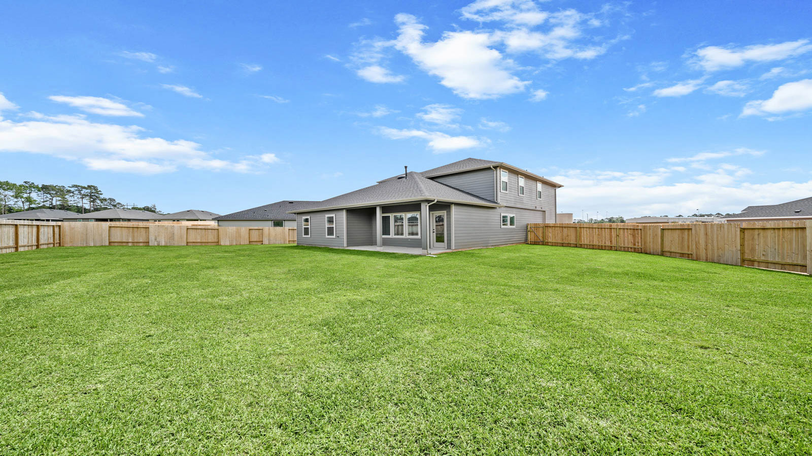 covered patio with overhead lighting