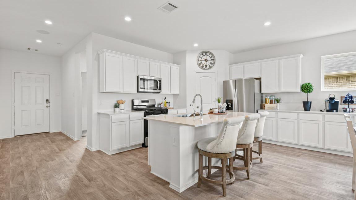 kitchen with stainless steel appliances and quartz countertops
