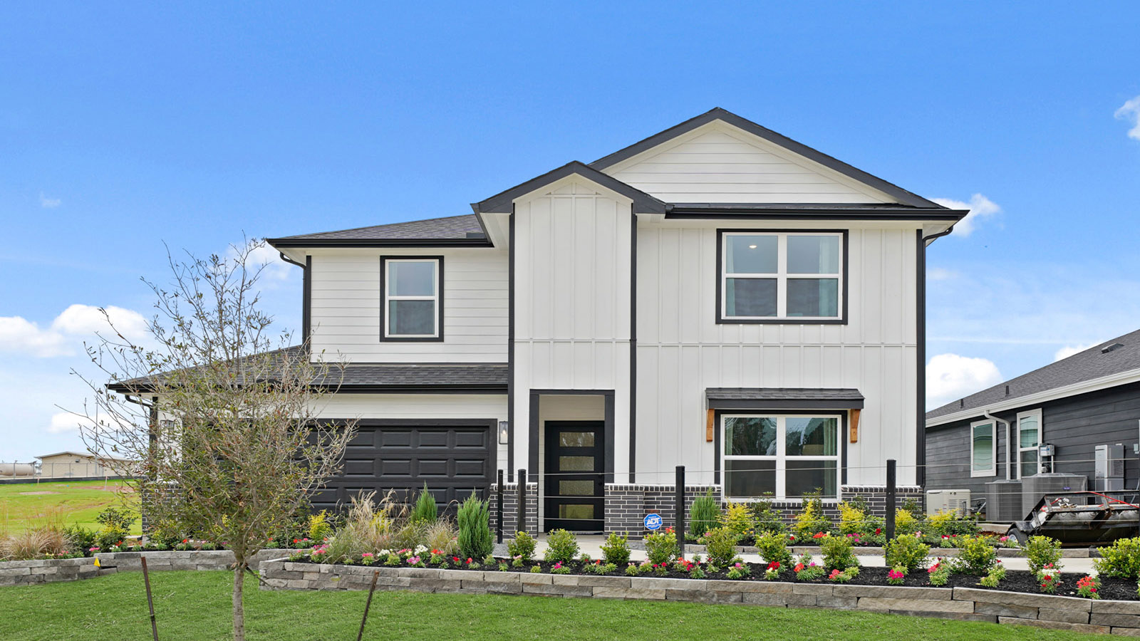 two story house with 2 car garage