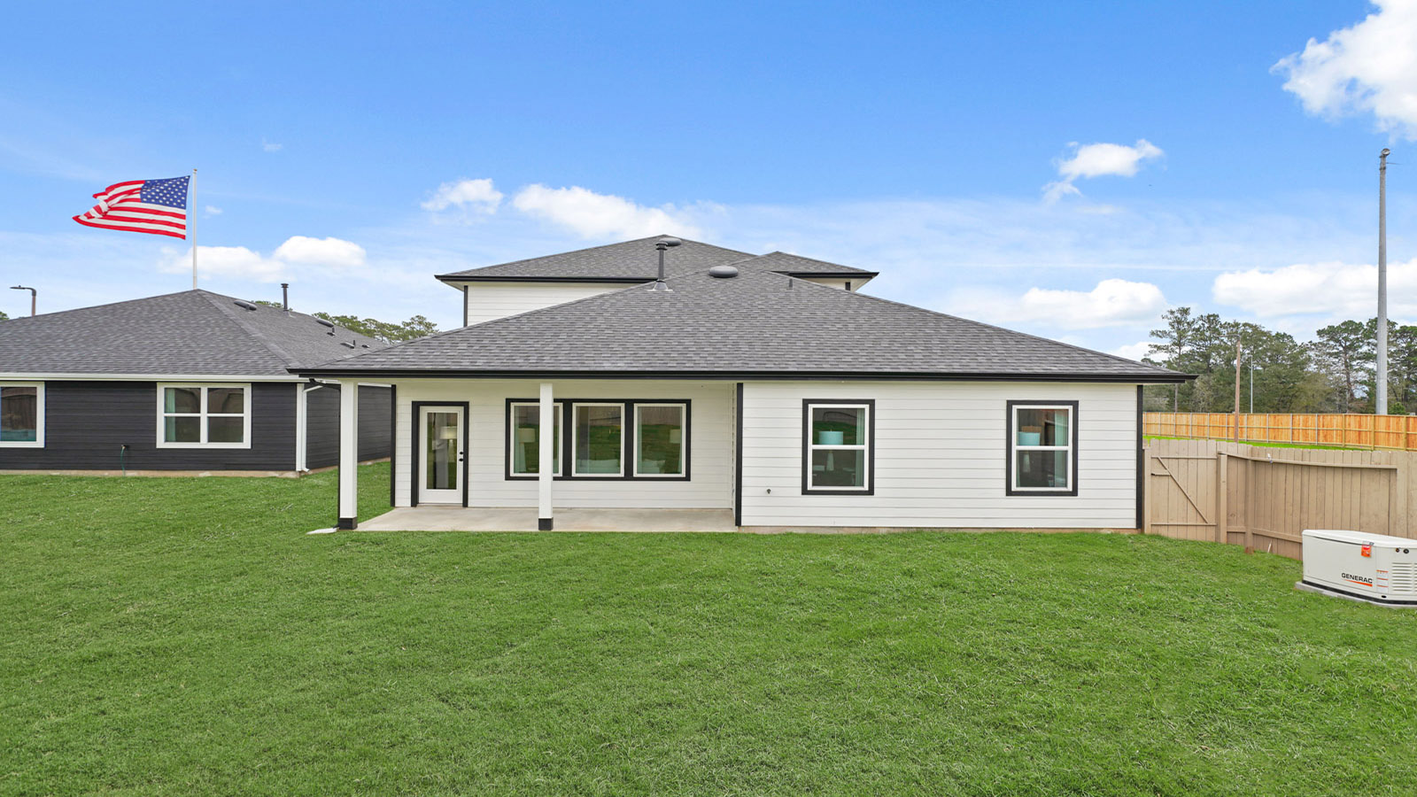 covered patio with jamies hardie siding and overhead lighting