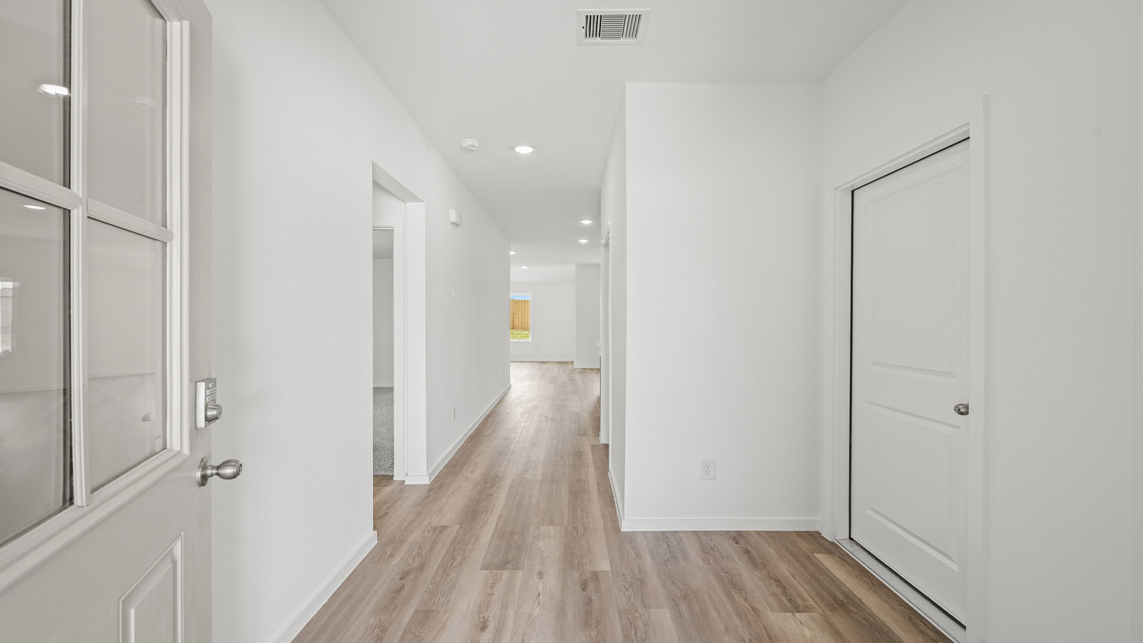 Entry hallway with vinyl flooring