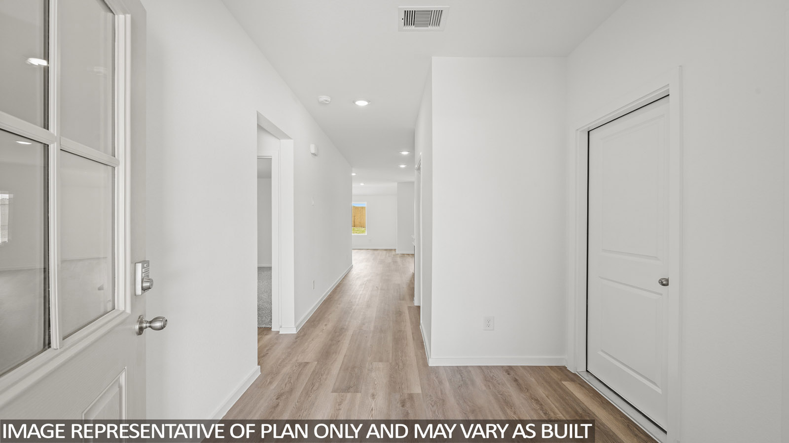 Entry hallway with vinyl flooring