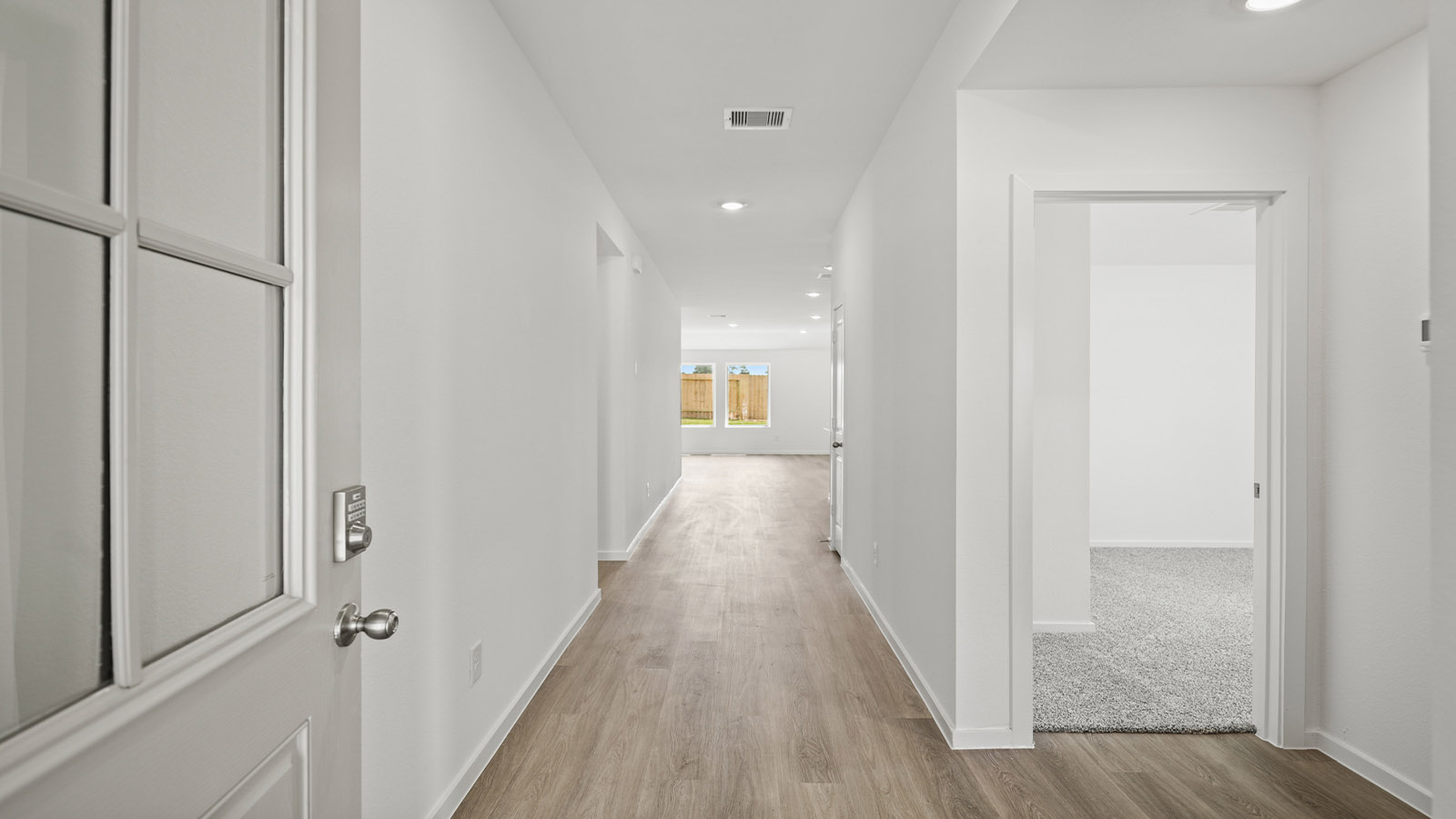 Entry hallway with vinyl flooring