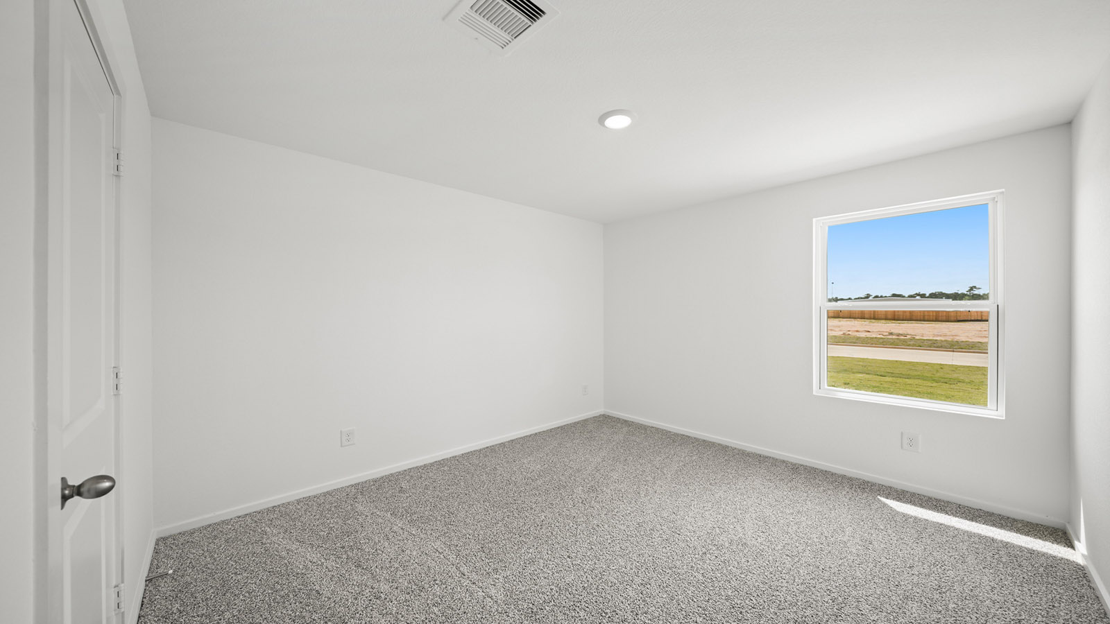 Secondary bedroom with bright window