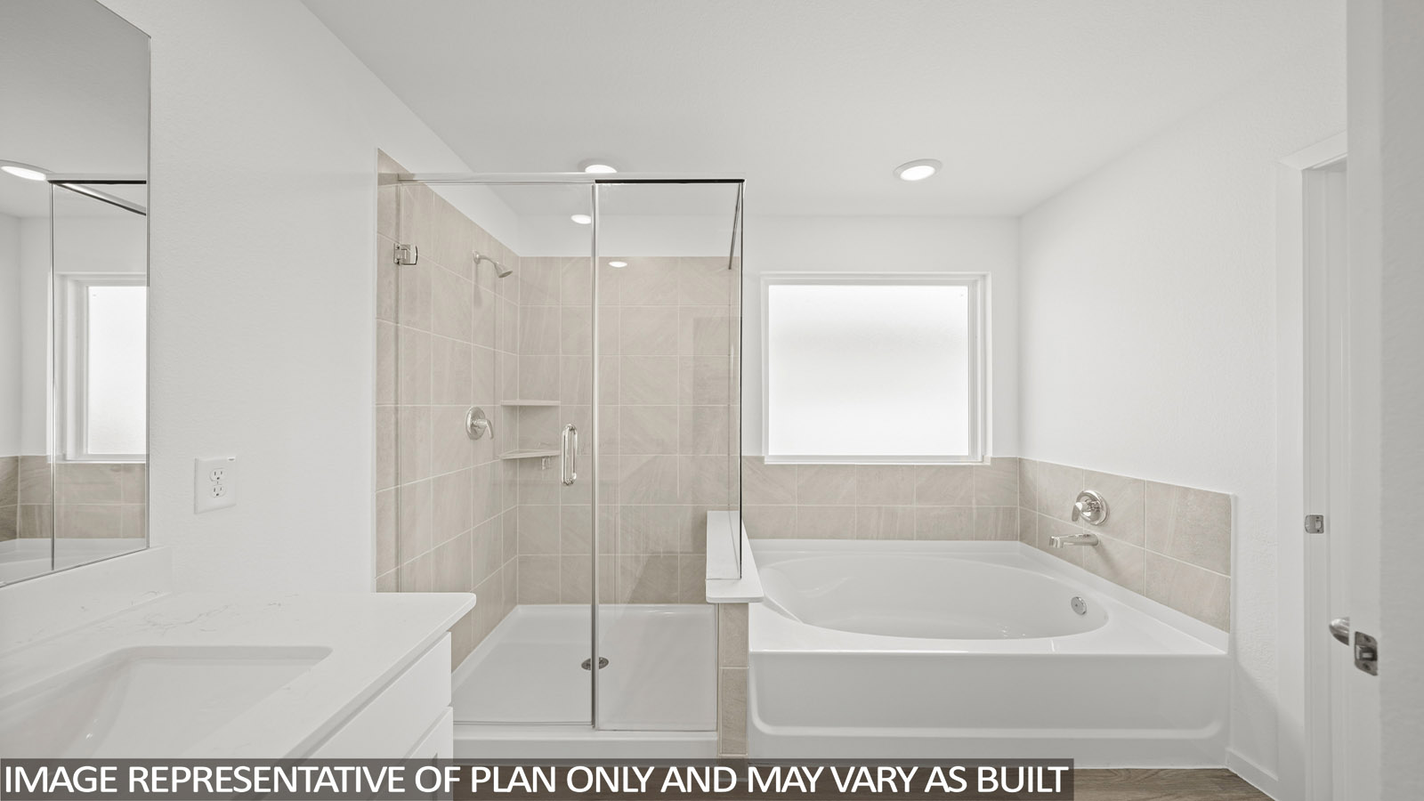 primary bathroom with separate tub and shower