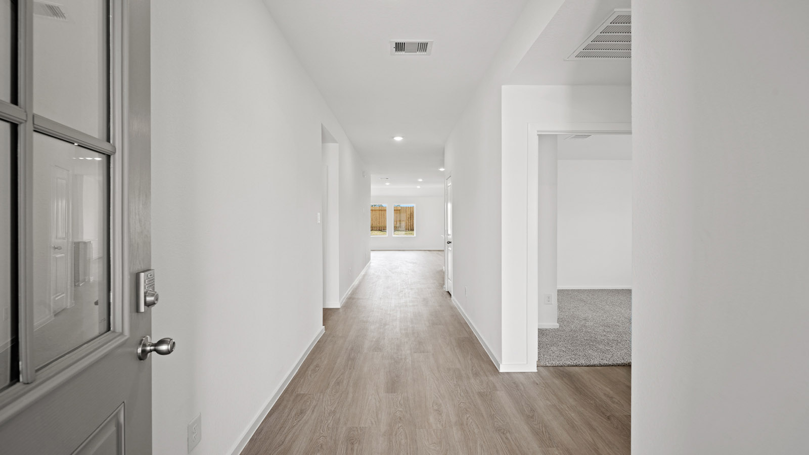 Entry hallway with vinyl flooring
