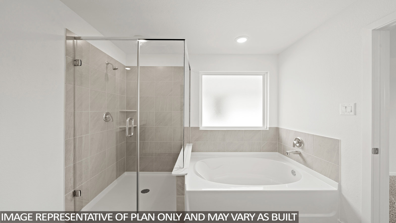 Primary bathroom with tub and shower