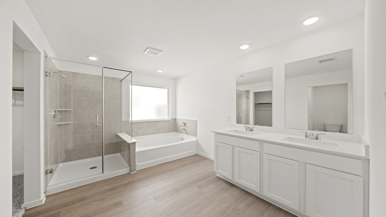 Primary bathroom with tub and shower