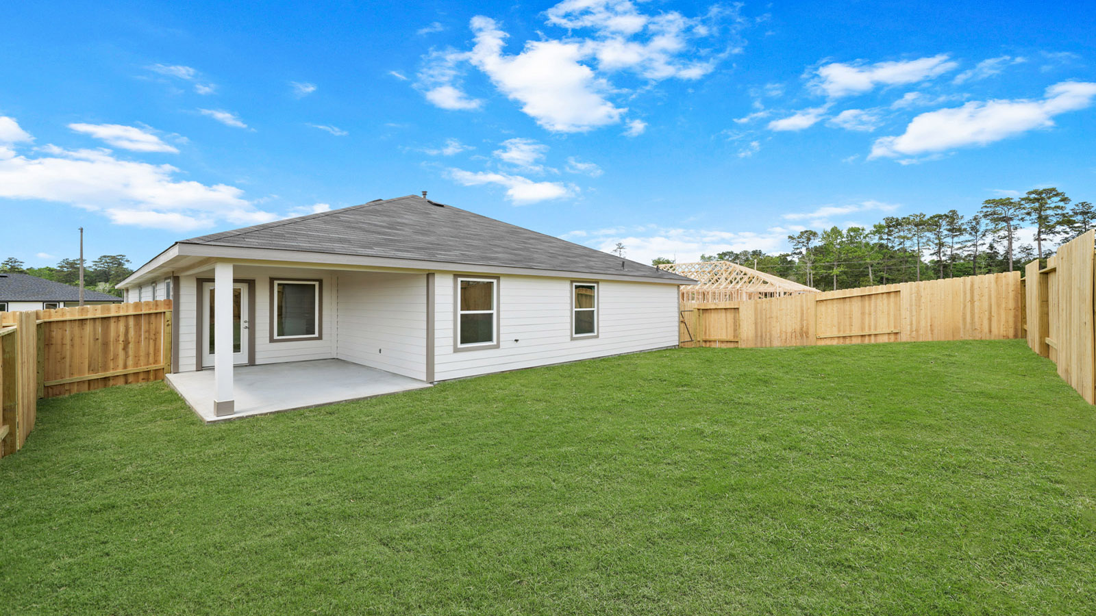 covered patio with overhead lighting