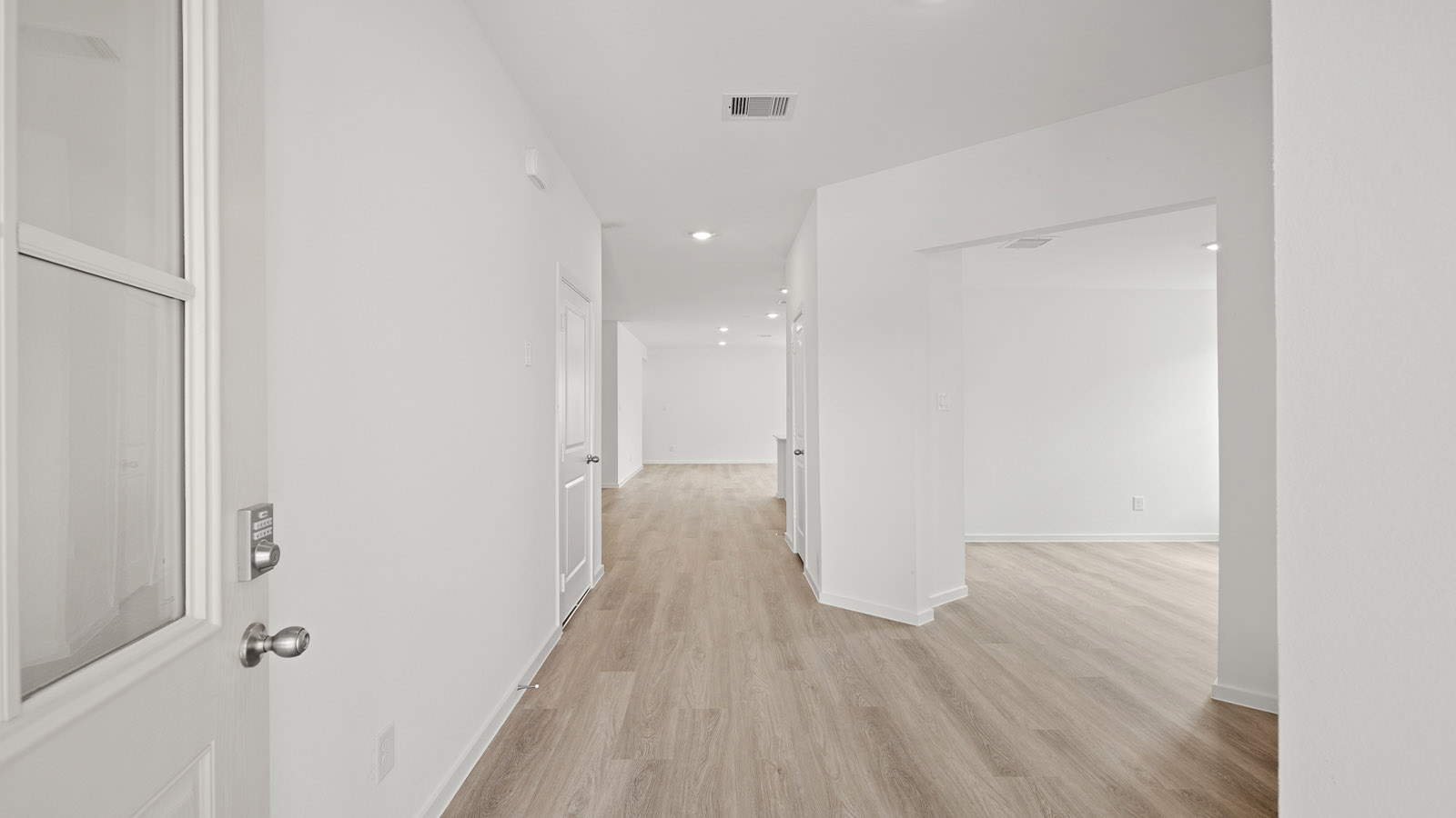 Entry hallway with vinyl flooring