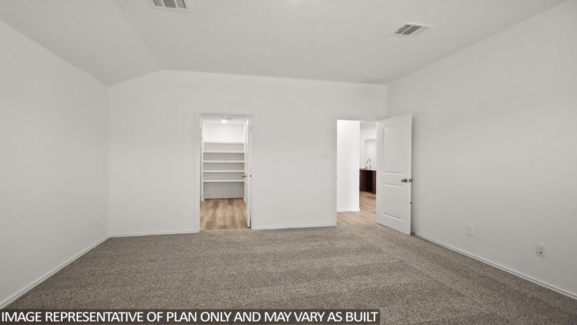open concept livving and dining area with vinyl flooring, quartz countertops, and large windows in Hockley, TX