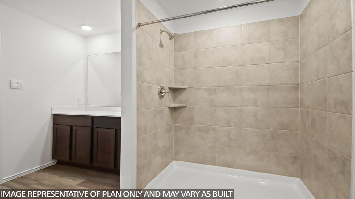 primary bathroom with built in shelving