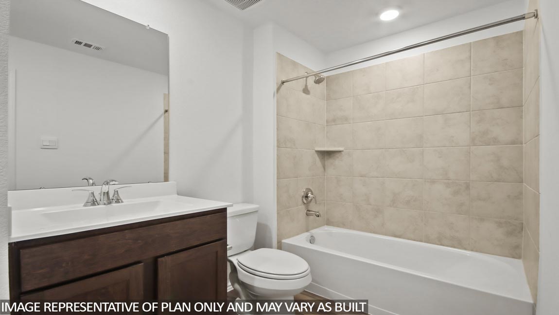 primary bathroom with built in shelving