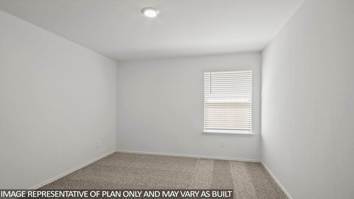 bedroom with carpet flooring and window