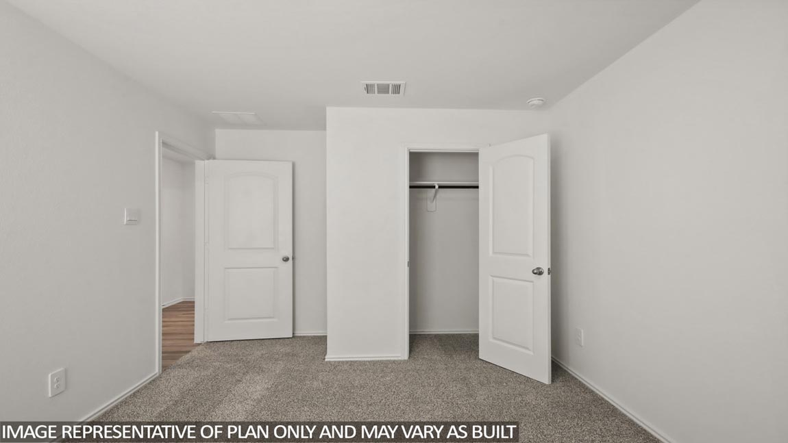 bedroom with carpet flooring and window