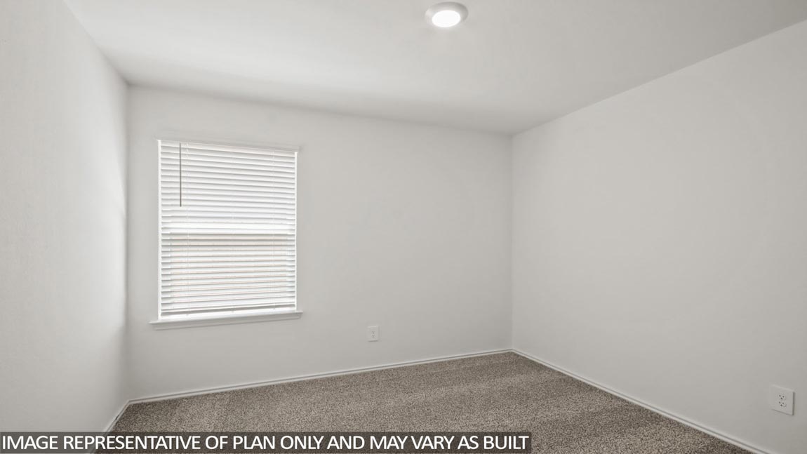 bedroom with carpet flooring and window