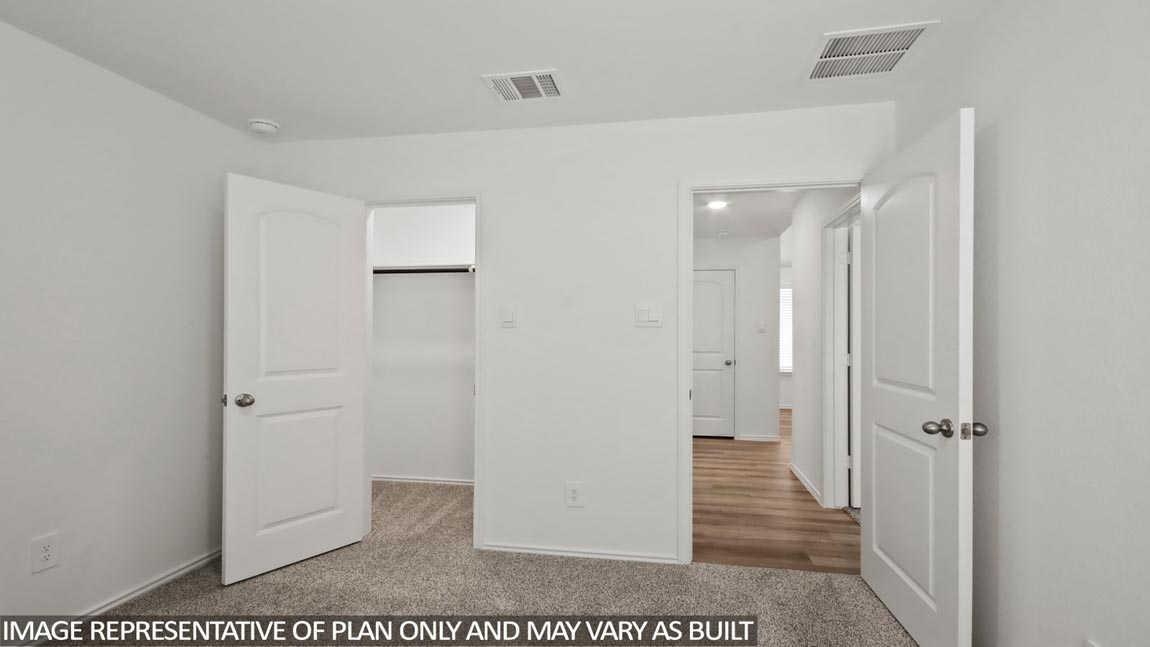 bedroom with carpet flooring and window