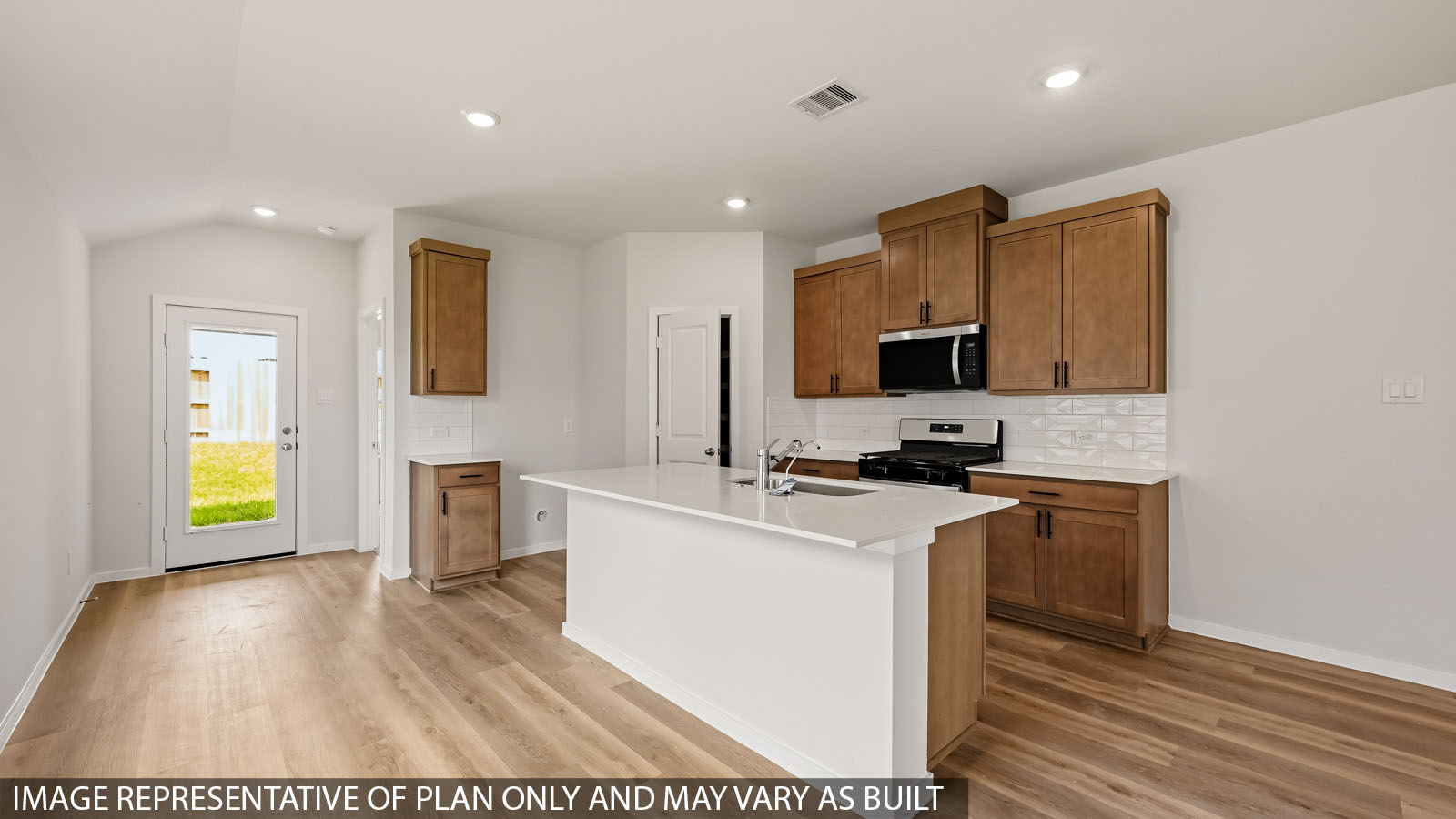 kitchen with quartz countertops and stainless steel appliances