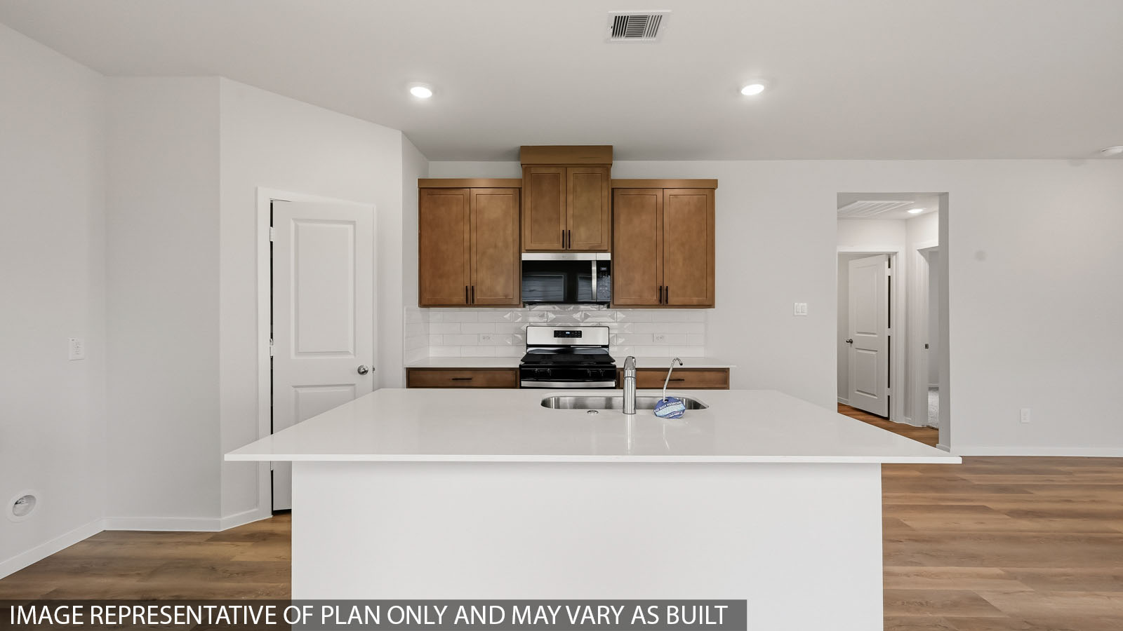 kitchen with quartz countertops and stainless steel appliances