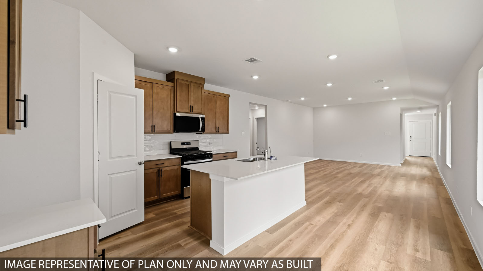 kitchen with quartz countertops and stainless steel appliances