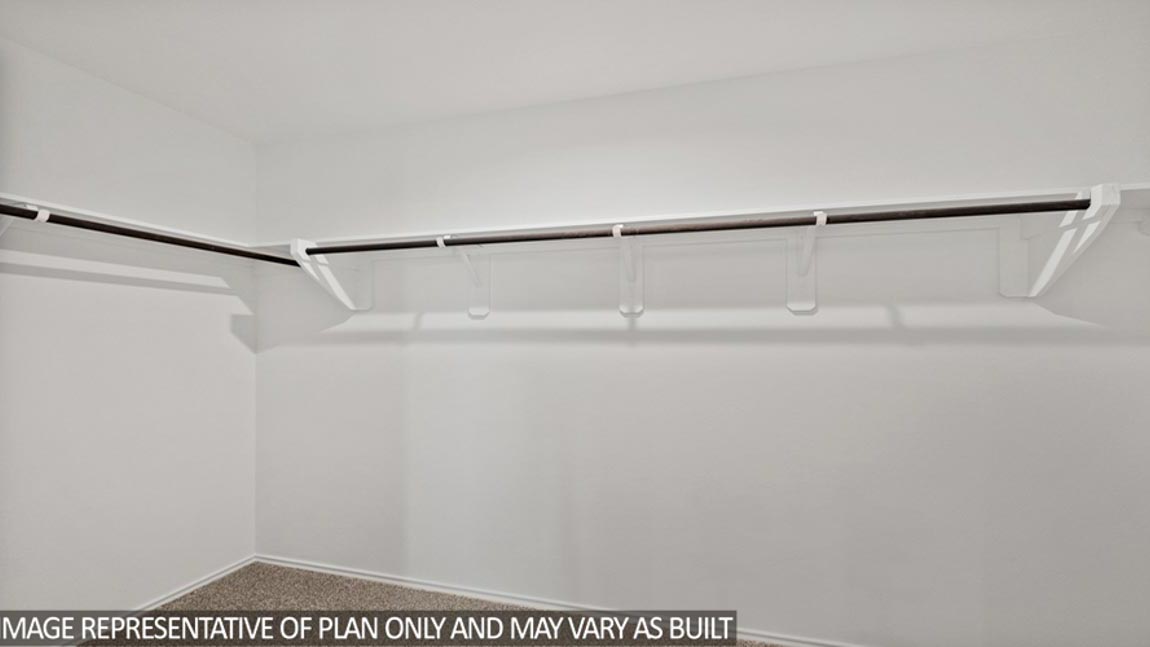 primary walk in closet in Hockley, Texas