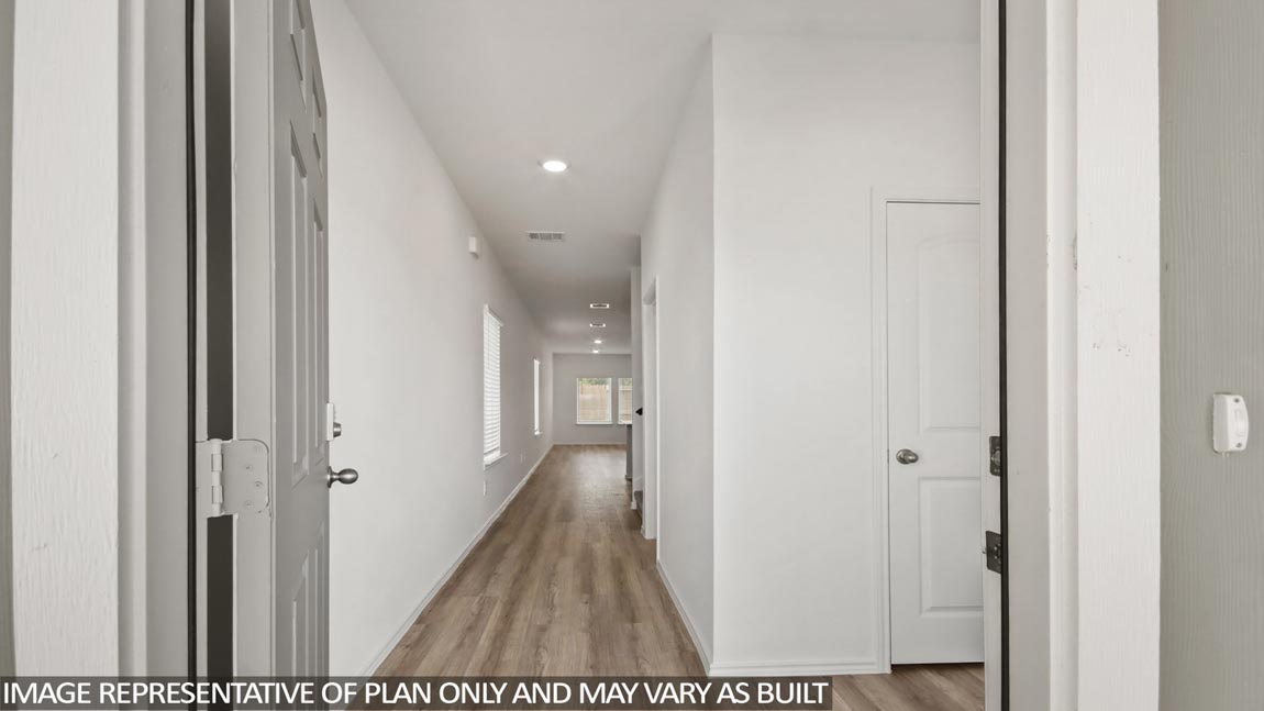 Entry hallway with vinyl flooring