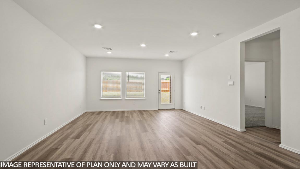 Open concept living, dining, and kitchen area