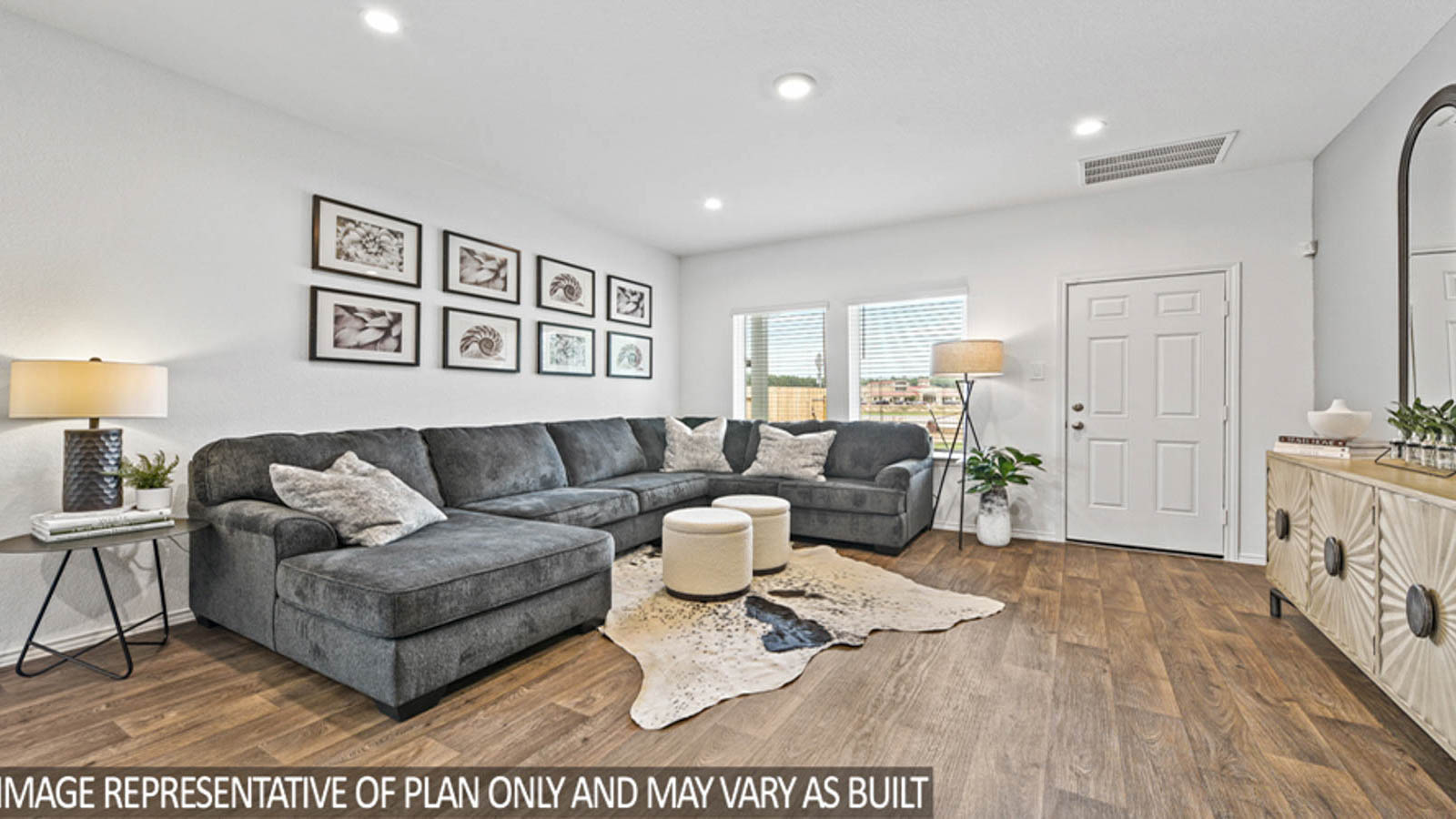 open concept livving and dining area with vinyl flooring