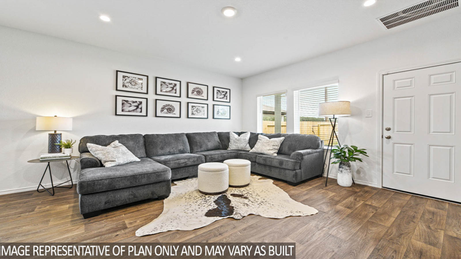 open concept livving and dining area with vinyl flooring