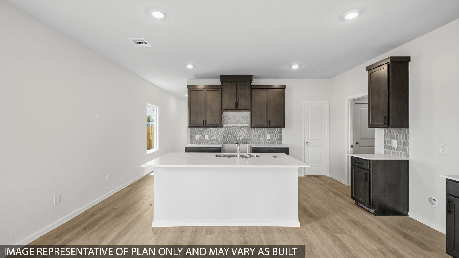 kitchen with backsplash and quartz countertops