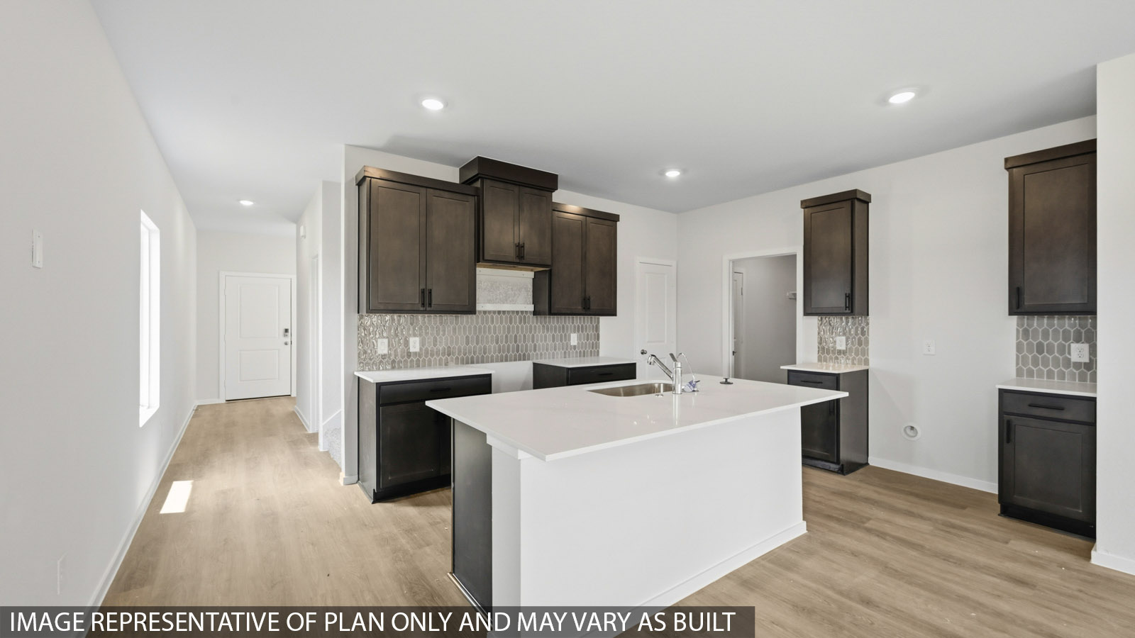 kitchen with backsplash and quartz countertops
