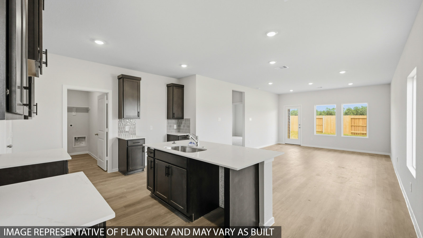 kitchen with backsplash and quartz countertops
