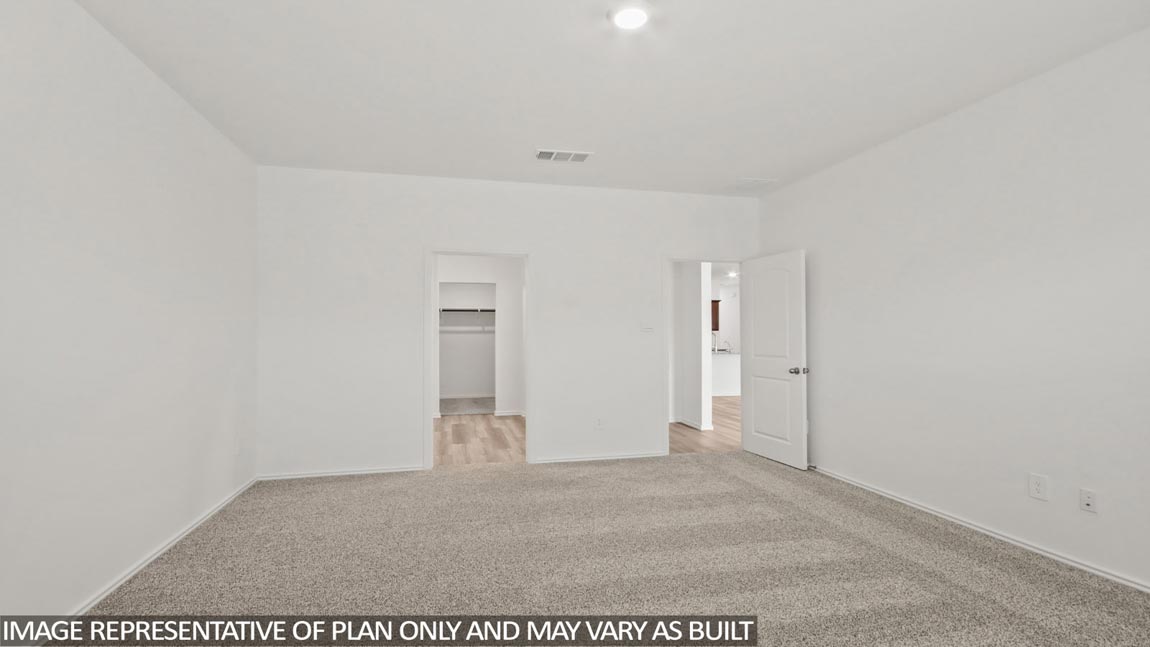 bedroom with carpet flooring and windows