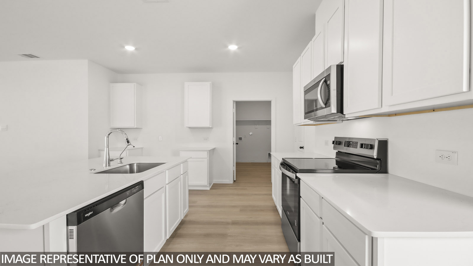 open concept livving and dining area with vinyl flooring, and quartz countertops