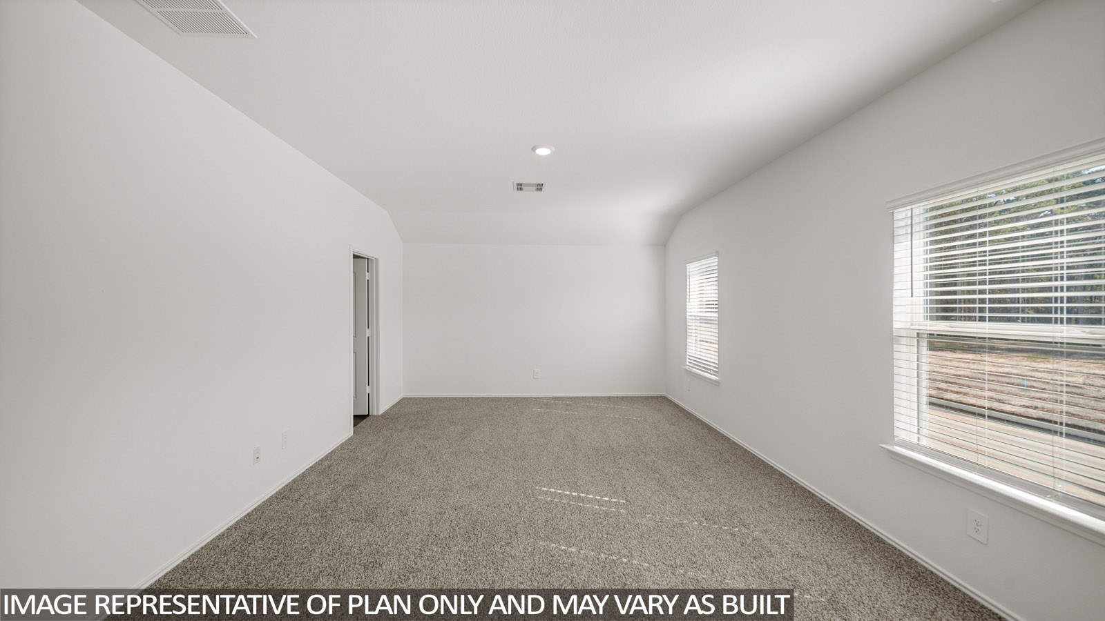 Large Primary bedroom with shag carpet flooring and bright window