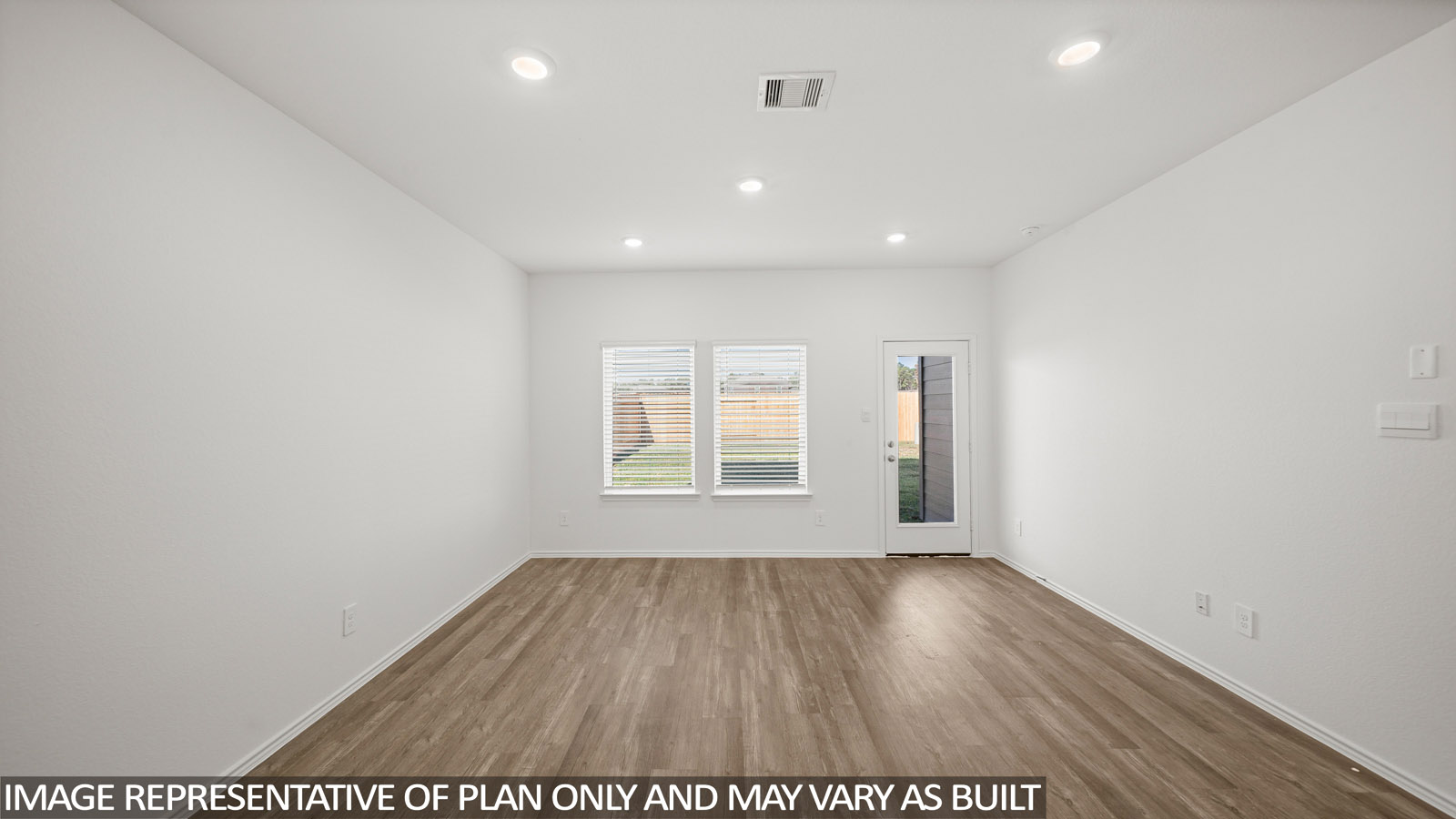 open concept living and dining area with vinyl flooring, quartz countertops, and large windows