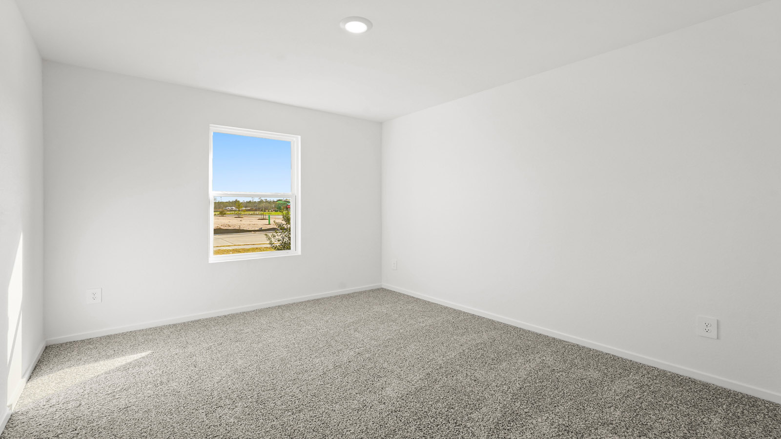 Secondary bedroom with bright window