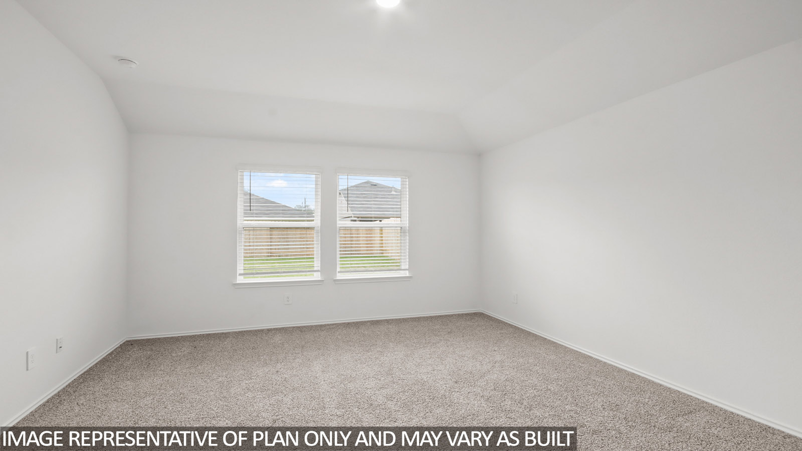 open concept living and dining area with vinyl flooring, large windows, and quartz countertops in Hockley, Tx