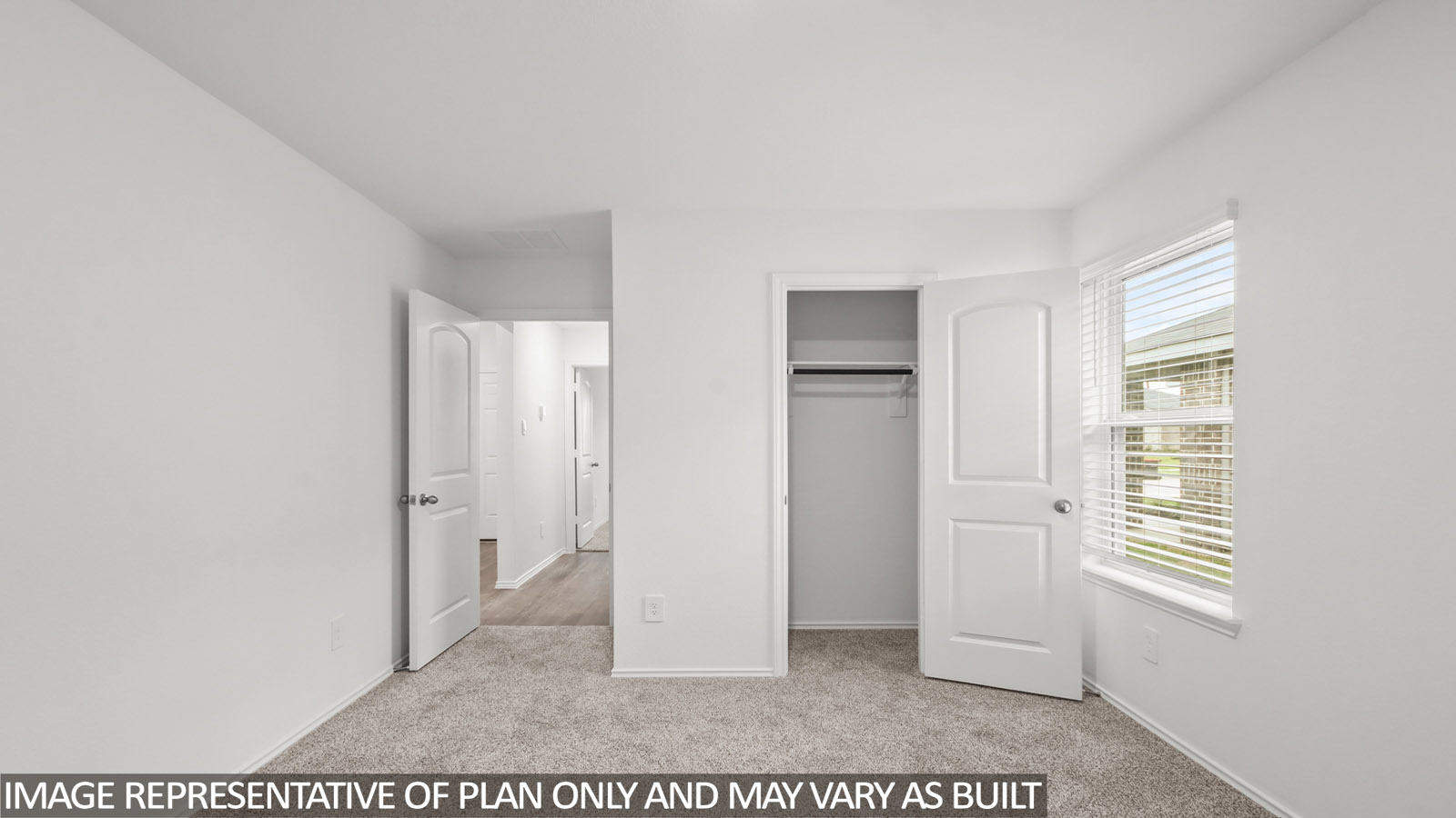 bedroom with carpet flooring and window