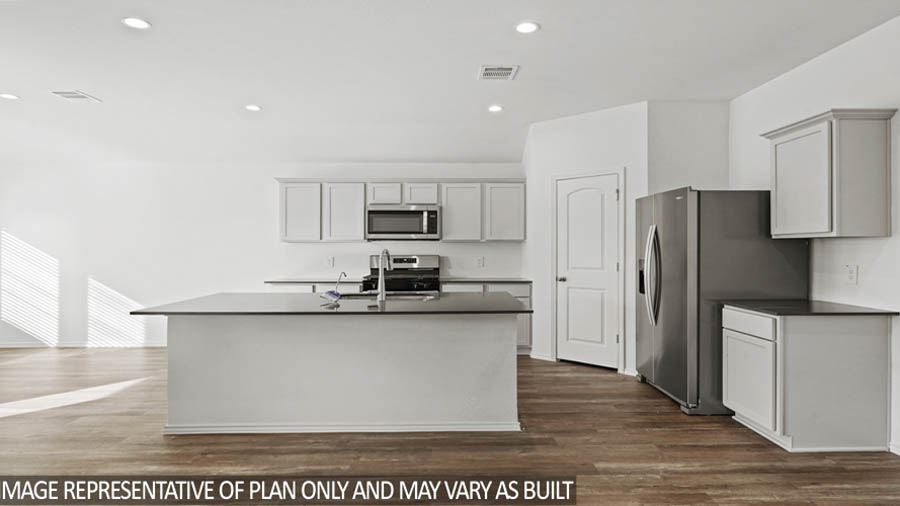 open concept living and dining area with vinyl flooring