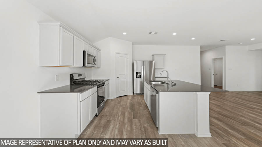 open concept living and dining area with vinyl flooring