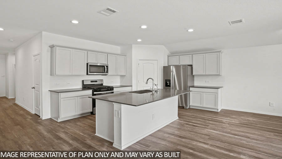 kitchen with stainless steel appliances and quartz countertops