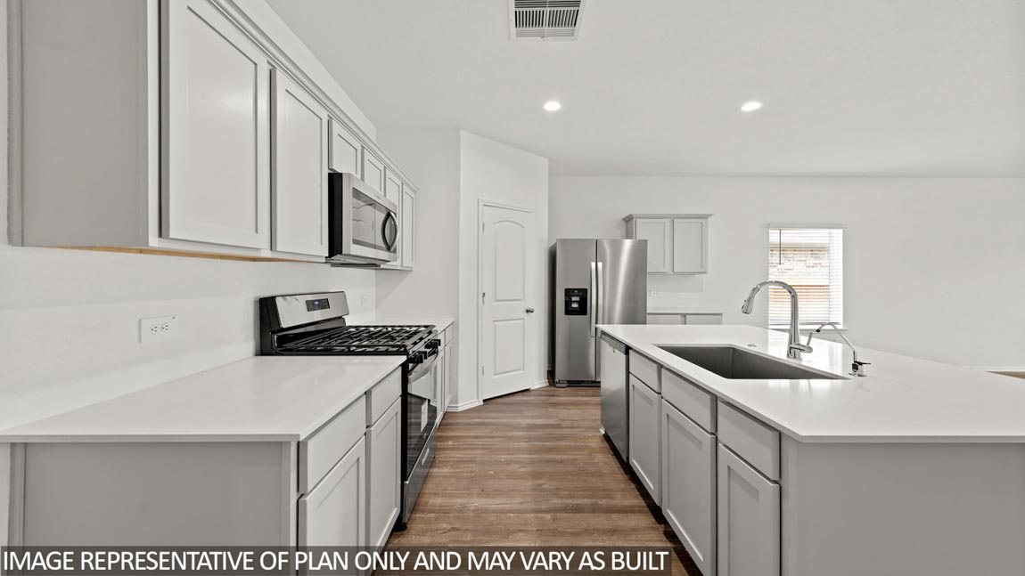 open concept living and dining area with vinyl flooring, large windows, and quartz countertops