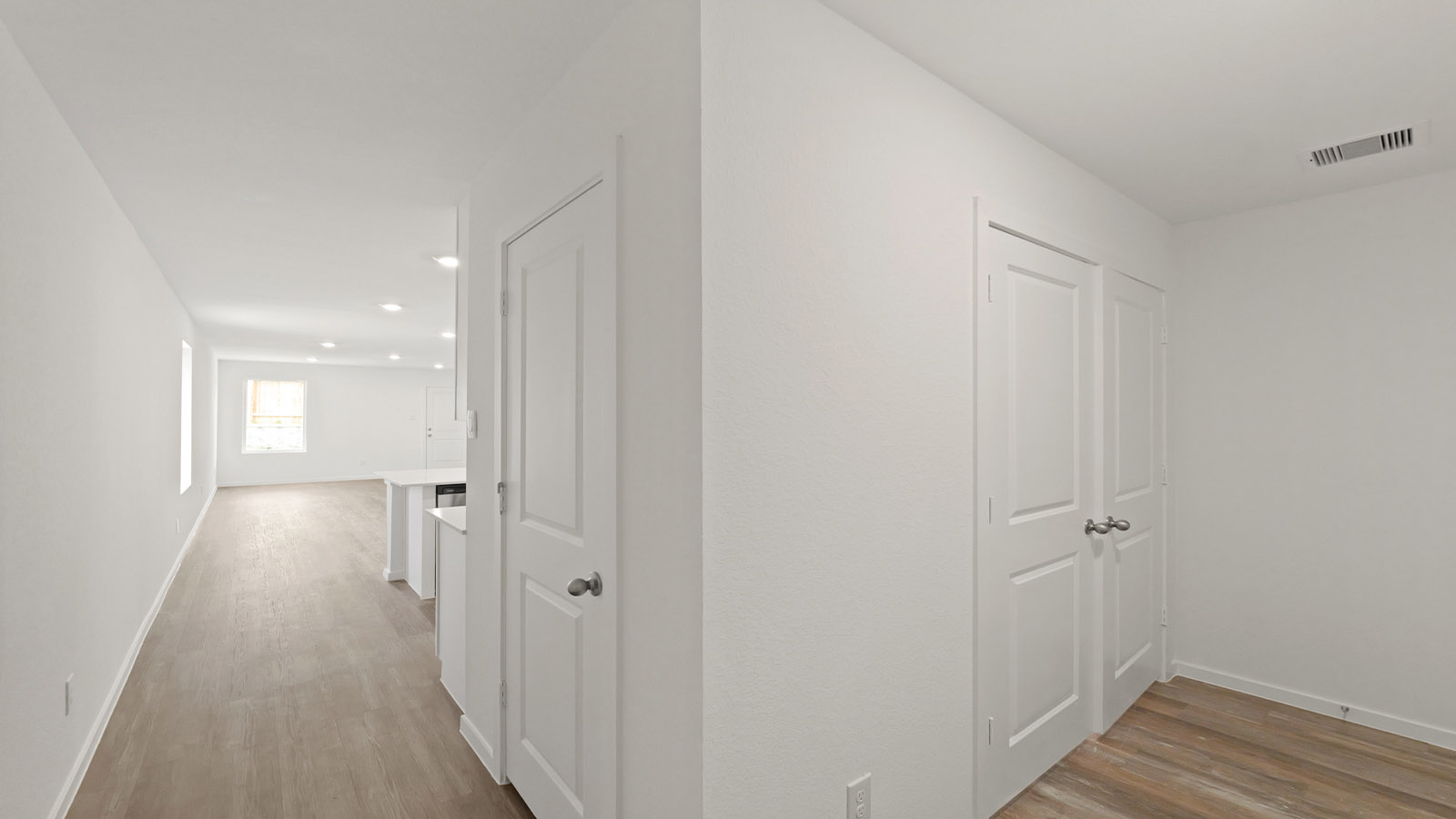 Entry hallway with vinyl flooring